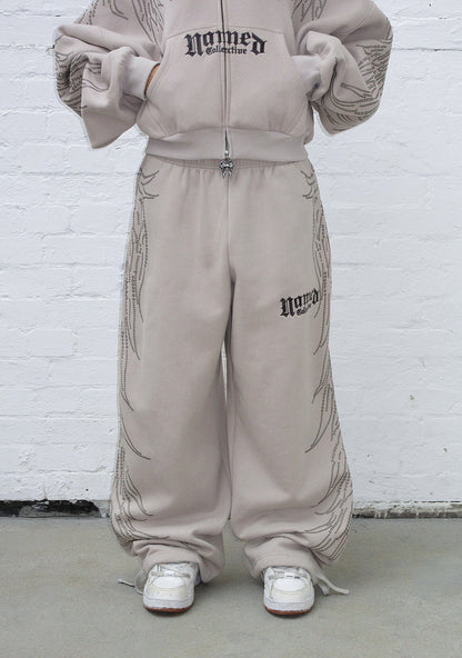 FALLEN STUDDED OVERSIZED SWEATPANTS BONE