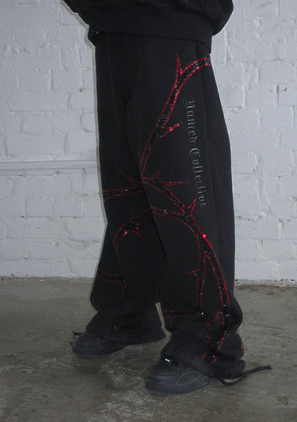 THORN RHINESTONE SWEATPANTS BLACK AND RED